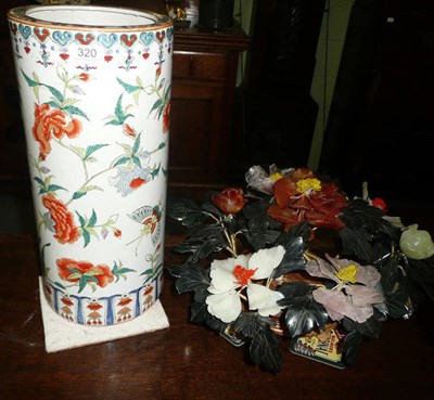 Lot 320 - A Chinese stick stand (drilled) and a floral display