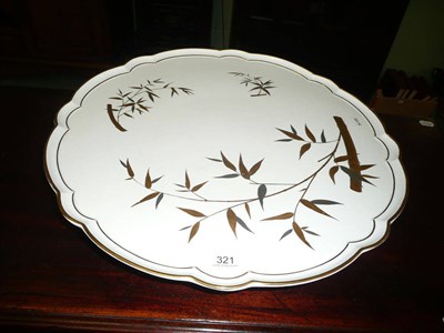 Lot 321 - A lazy Susan stamped 'Minton'