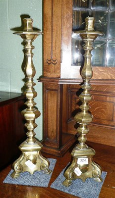 Lot 324 - A pair of brass alter candlesticks (a.f)