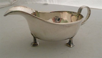 Lot 331 - A E Jones, Birmingham sauce boat of Arts and Crafts design