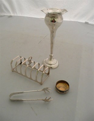 Lot 346 - Silver toast rack, silver sugar nips, silver fluted vase and silver bottle top