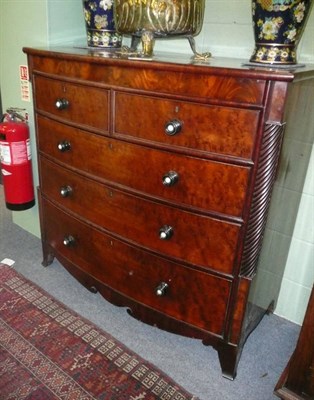 Lot 414 - A 19th century mahogany bow fronted chest