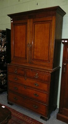 Lot 424 - A 19th century oak and mahogany cross banded kitchen press