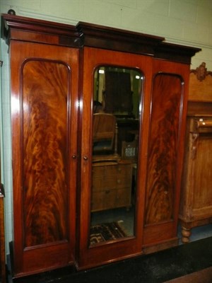 Lot 428 - A Victorian mahogany triple door wardrobe