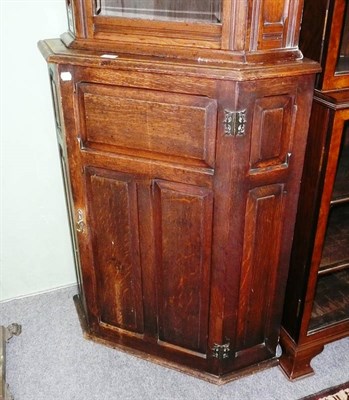 Lot 431 - A late 19th century oak floor standing corner cupboard