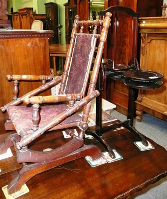 Lot 439 - An American child's rocking chair and a folding mahogany cake stand (2)