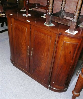 Lot 447 - A 19th century mahogany D-shaped side cabinet