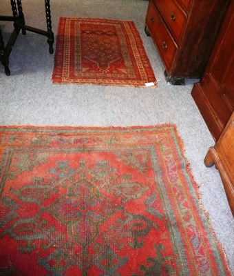 Lot 455 - Maples' Ushak rug, West Anatolia, with tomato read field and an Anatolian prayer rug (2)