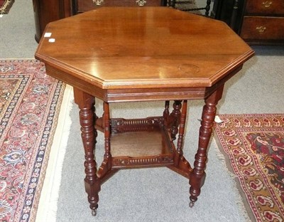 Lot 474 - An Edwardian walnut centre table