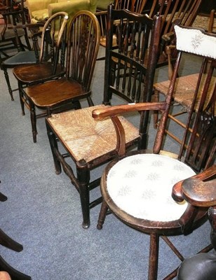 Lot 491 - An Edwardian corner chair, two kitchen chairs, a spindle back rush seated chair, Edwardian armchair