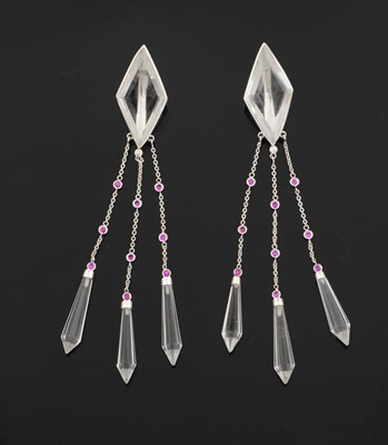 Lot 370 - A Pair of Rock Crystal Drop Earrings, a diamond set rock crystal suspends three chains with...