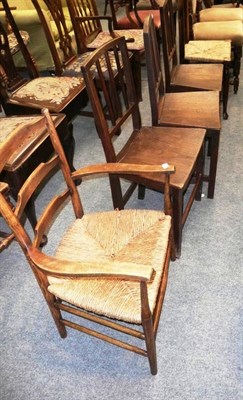 Lot 503 - Two carved oak hall chairs, small open ladder-back armchair, three panel-seated kitchen chairs, two