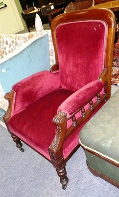 Lot 510 - An early Victorian mahogany framed armchair, circa 1860, upholstered in red velvet, with padded...