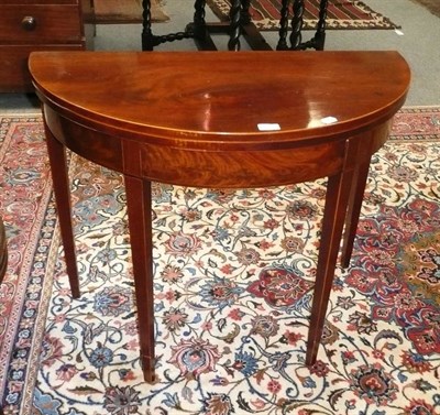 Lot 512 - Mahogany demi-lune tea table