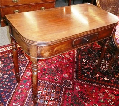 Lot 515 - A Regency mahogany fold over tea table