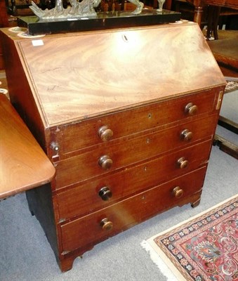 Lot 522 - Early 19th century mahogany bureau