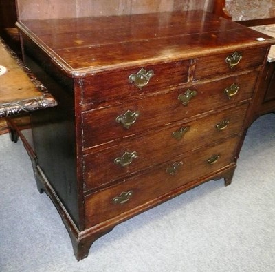 Lot 541 - George III oak five drawer chest