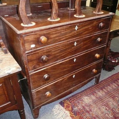 Lot 543 - A 19th century mahogany four height chest