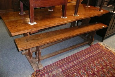 Lot 547 - Oak table and two benches