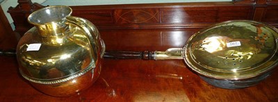 Lot 567 - Brass warming pan and a brass flagon