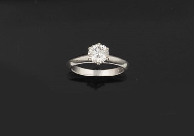 Lot 378 - A Platinum Diamond Solitaire Ring, by Tiffany, the round brilliant cut diamond in a six claw...