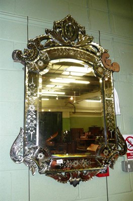 Lot 581 - A Venetian pier glass mirror with floral decoration