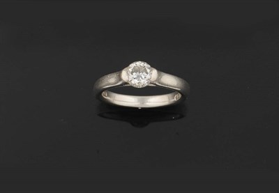 Lot 379 - A Platinum Diamond Solitaire Ring, by Paul Spurgeon, 1998, the round brilliant cut diamond held...