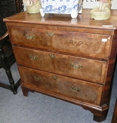 Lot 588 - Walnut and mahogany crossbanded chest of drawers