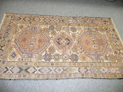 Lot 591 - An Eastern fringed rug