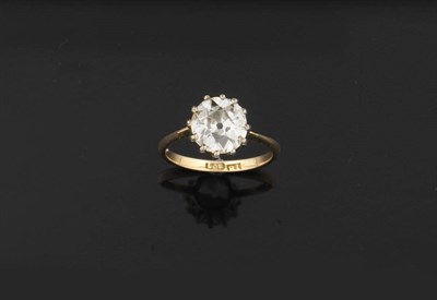 Lot 381 - A Diamond Solitaire Ring, the old brilliant cut diamond in a white claw setting to a yellow tapered