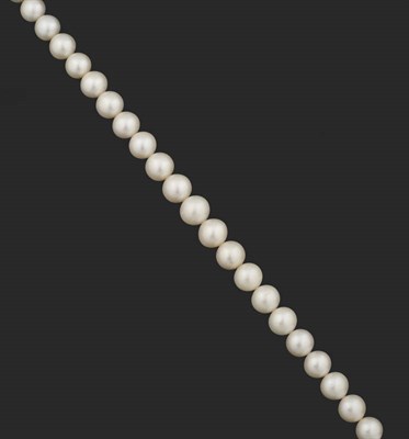 Lot 396 - A Single Strand of Cultured South Sea Pearls, the slightly graduated cream coloured pearls sit...