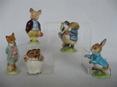 Lot 1043 - Five Beswick Beatrix Potter figures 'Tommy Brock', BP2a; 'Pigling Bland', BP2a; 'Peter Rabbit',...