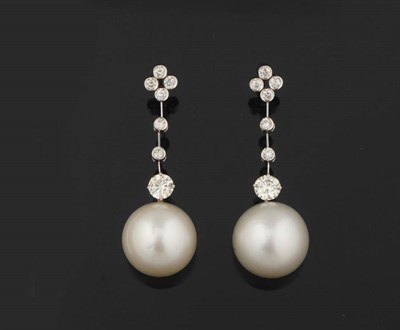 Lot 397 - A Pair of 18 Carat White Gold Cultured South Sea Pearl and Diamond Earrings, a quatrefoil...