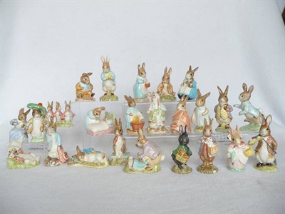 Lot 1052 - Twenty Four Royal Albert Beatrix Potter Rabbit figures some with boxes