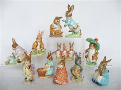 Lot 1058 - Eleven Beswick Beatrix Potter Rabbits, 'Peter Rabbit', BP3c; 'Mr Benjamin Bunny', BP3b; 'Mrs Rabbit