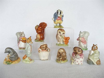 Lot 1062 - Eleven Beswick Beatrix Potter figures, Squirrel Nutkin; Goody Tiptoes; Timmy Tiptoes; Foxy...