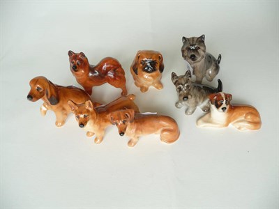 Lot 1085 - Eight miniature Royal Doulton Dogs, Pekinese (seated), K6; Cocker Spaniel (seated), K9A; Cairn...