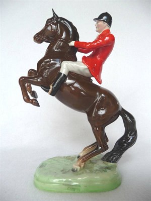 Lot 1098 - Beswick Huntsman on Rearing Brown Horse, model No. 868 (style two), gloss, 25.4cm high (very...