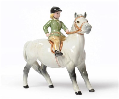 Lot 1102 - Rare Beswick Girl on Grey Pony, model No. 1499, light dapple grey pony, rider in green jacket...