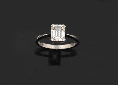 Lot 403 - A Platinum Emerald-Cut Diamond Solitaire Ring, the diamond held in a four corner claw setting...