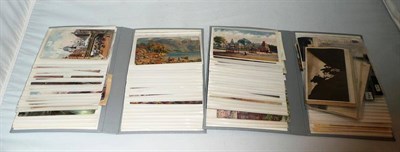 Lot 7 - A collection of Tucks 'Oilette' postcards and other cards in two albums and loose