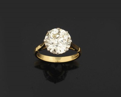 Lot 404 - An 18 Carat Gold Diamond Solitaire Ring, the round brilliant cut diamond in a white eight claw...