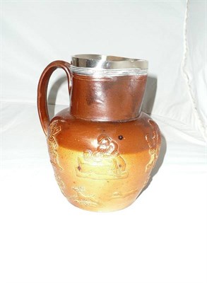 Lot 15 - A Nottingham stoneware harvest jug with silver mount