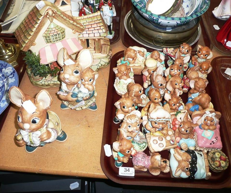 Lot 34 - Pendelfin fruit shop, two Pendelfin mum and dad figures and twenty four Pendelfin figures