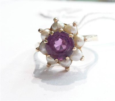 Lot 64 - An amethyst and pearl cluster ring