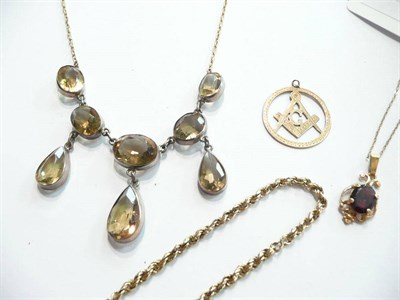 Lot 72 - A citrine pendant necklace, a rope bracelet, a Masonic pendant on chain and a garnet pendant on...