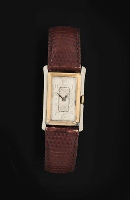 Lot 416 - An Art Deco Two Colour Gold Rectangular Wristwatch, 1929, 15-jewel lever movement, bimetallic...