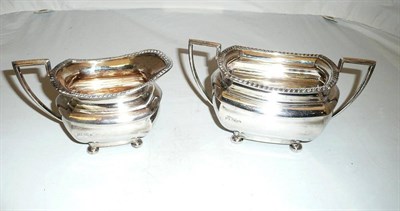 Lot 131 - Silver sugar bowl and cream jug en-suite, Sheffield 1933 by Walker & Hall