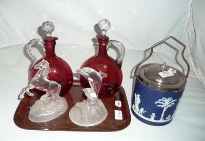 Lot 153 - A Wedgwood biscuit barrel, two frosted glass paperweights and two glass jugs