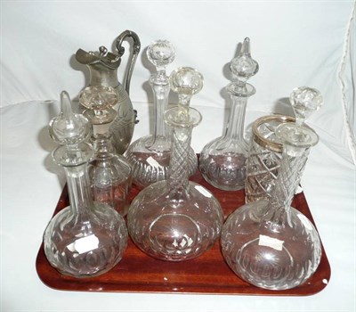 Lot 173 - Tray of glass decanters, silver rim vase, etc